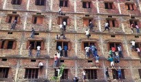 Family and friends climb buildings to help students cheat on examinations.